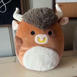 Squishmallow Shep the Bull with fuzzy hair and nose ring